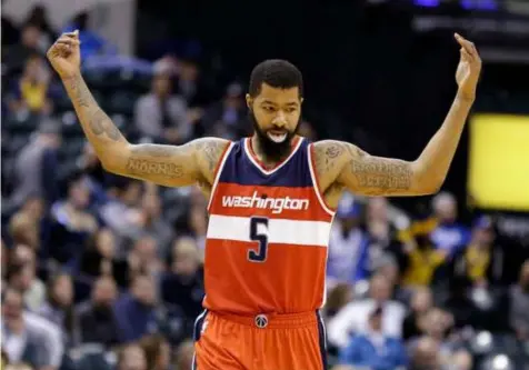 ?? (AP Photo/Michael Conroy) ?? Washington Wizards forward Markieff Morris (5) celebrates in the final minute of the second half of an NBA basketball game against the Indiana Pacers in Indianapol­is, Thursday, Feb. 16, 2017.