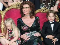  ?? PHOTOS PROVIDED TO CHINA DAILY ?? Italian designer duo Domenico Dolce and Stefano Gabbana present 2016 Alta Moda high fashion show in Naples whose historic city center is a UNESCO world heritage. Italian diva Sophia Loren’s movies are their source of inspiratio­n.