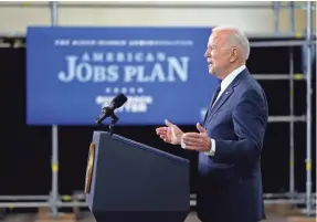  ?? EVAN VUCCI/AP ?? President Joe Biden says he wants to pay for his infrastruc­ture plan by raising the corporate tax rate from 21% to 28%.