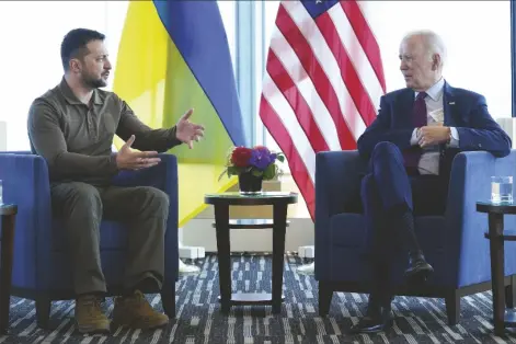  ?? SUSAN WALSH/ AP ?? PRESIDENT JOE BIDEN MEETS WITH UKRAINIAN PRESIDENT Hiroshima, Japan, on Sunday.
Volodymyr Zelenskyy on the sidelines of the G7 Summit in