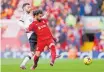  ?? Reuters ?? Manchester United’s Bruno Fernandes and Liverpool’s Mohamed Salah. |