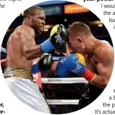  ??  ?? SOLE SETBACK: Russell [left] lands a right hand on Lomachenko, but ends up losing on a majority decision