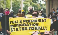  ?? TIJANA MARTIN / THE CANADIAN PRESS ?? People march Sept. 12 toward Deputy Prime Minister Chrystia Freeland's office in Toronto, during a rally led by current and former internatio­nal students calling for changes to immigratio­n rules during COVID-19.