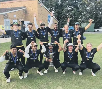  ??  ?? Peterborou­gh Town seconds celebrate their Northants T20 Cup success.