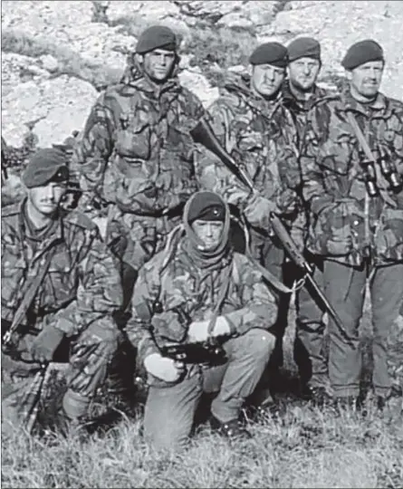  ?? Picture: Trustees of the Royal Marines Museum ?? Commando Headquarte­rs. Standing fifth from the right is Lt Col Andrew Whitehead, who is now living in Cleish, Perth Transport.