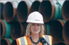  ?? CP FILE PHOTO ?? Premier Rachel Notley speaks to media during a tour of Enbridge’s Line 3 pipeline replacemen­t project in Hardisty, Alta., in August.