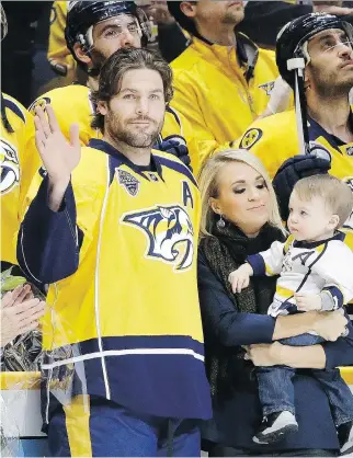  ?? MARK HUMPHREY/THE ASSOCIATED PRESS ?? Predators captain Mike Fisher announced his retirement Thursday to spend more time with his wife, Carrie Underwood, and their son, Isaiah. Fisher was drafted by Ottawa in 1998.