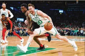  ?? TIM BRADBURY / GETTY IMAGES ?? Celtics forward Gordon Hayward clearly still needs time. His 3-point shooting is mired at 28 percent. The lesson: Don’t trust all those offseason workout videos you see of players swishing shots.