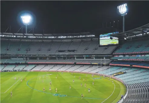  ??  ?? ALL QUIET: Spectators at home had the best seats in the house as fans were shut out of AFL and NRL matches.