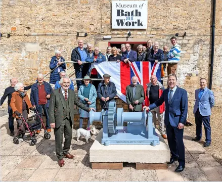  ?? ?? Mayor Dan Norris unveils a ship “winch” built by Bath engineerin­g company Stothert and Pitt and used during the Second World War that has been restored thanks to funding from the West of England Combined Authority