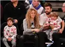  ??  ?? Keeping the balance … Shakira and Gerard Piqué, with their sons Milan, left, and Sasha at a New York basketball game in 2017. Photograph: James Devaney/Getty Images