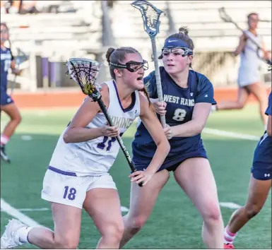  ?? Cory Rubin/The Signal ?? Valencia’s Katie von Mecklenbur­g holds off a Wildcat defender in a regular season game against West Valencia High School on April 9. The CIF-Southern Section will host girls championsh­ip games this season. Ranch at