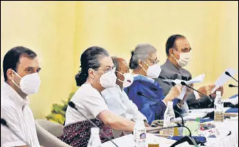  ?? PTI ?? Congress president Sonia Gandhi with party leader Rahul Gandhi and others during the Congress Working Committee meeting, at AICC headquarte­rs in New Delhi on Saturday.