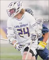  ?? ?? UAlbany senior attack Jack Pucci finished with a team-high four goals, including a pair of clutch tallies in the second half after Drexel had twice rallied to within two goals.