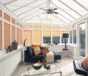  ??  ?? Blinds and Awnings’ range of fabric conservato­ry blinds with solar reflective coatings.