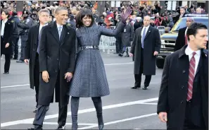  ??  ?? President Barack Obama and First Lady Michelle Obama wind their way back to the White House during the Inaugural Parade in Washington DC in 2013.