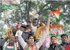  ?? AFP ?? India’s Congress party supporters celebrate in New Delhi yesterday.