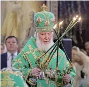  ?? /Reuters ?? Backer: Patriarch Kirill of Moscow and All Russia. The head of the Russian church supports President Vladimir Putin.