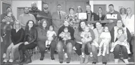  ?? Mona Weatherly ?? Celebratin­g Early Head Start above are, seated, from left, Danielle Hendricks; Jeana Chancellor; Stephanie Meyers holding Aitana; CaLee Thomsen holding Arianna; Lorna Vincent holding Greyson; Melissa Slagle holding Jaymee; and Christie Ference, assistant director, holding Gianna. Standing: Julia Russell holding Easton; Ahren Finney; Dan Knoell, city administra­tor; Rod Sonnichsen, mayor; Jeannette Birnie, area manager; Stephanie Grafel, Chamber director; Sid Fessler, Chamber vice-president; Kandi Peters, city clerk; Chris Smith; Kristy Wells; and Megan Linn, city deputy clerk.