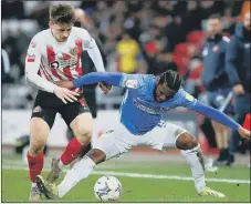  ?? Picture: Will Matthews/PA Wire ?? UP FOR THE SCRAP Pompey wing-back Mahlon Romeo in the thick of the action against Sunderland