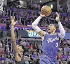  ?? ALONZO ADAMS / ASSOCIATED PRESS ?? Thunder guard Russell Westbrook could become the first player to average a tripledoub­le for a full season since Oscar Robertson in 1961-62.