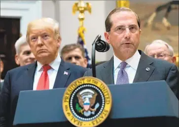  ?? Chris Kleponis EPA-EFE/REX ?? ALEX AZAR, Health and Human Services secretary, shown with President Trump, seeks to rein in costs by requiring prices to be disclosed in TV drug ads. The industry’s trade group says patients would be confused.