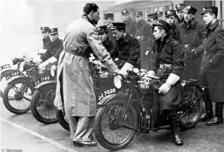  ??  ?? A newly introduced squad of GPO telegraph messengers prepare to go out on their motorcycle­s in 1933.