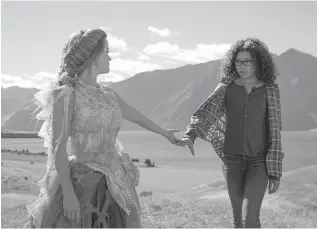  ?? Disney ?? ■ Reese Witherspoo­n, left, and Storm Reid in a scene from “A Wrinkle In Time.”