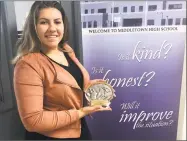  ?? Paul Augeri / For Hearst Connecticu­t Media ?? Middletown High senior bowler Alexandra Dombrowski poses with her state championsh­ip trophy.