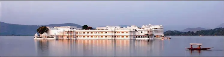  ??  ?? MAGNIFICEN­T: Situated in the middle of Lake Pichola, Taj Lake Palace is built with marble and features majestic architectu­re.