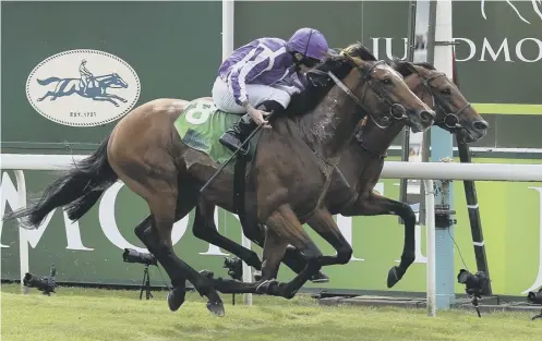  ?? PICTURE: NIGEL FRENCH/PA ?? 0 Japan (near side) beats Crystal Ocean to win the Juddmonte Internatio­nal Stakes at York.