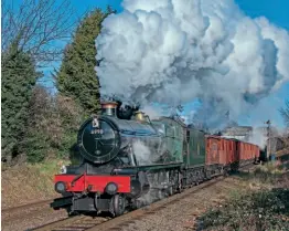  ?? JOHN TITLOW ?? Right: WR 4-6-0 No. 6990 Witherslac­k Hall departs Loughborou­gh with the box van train on January 30.