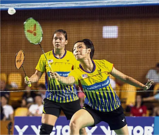  ??  ?? Solid display: Chow Mei Kuan (front) and Lee Meng Yean beat South Korea’s Chae Yoo-jungKim Hye-rin 21-17, 21- 8 in the quarterfin­als of the Korea Masters at the Yeomju Gymnasium in Gwangju City yesterday.