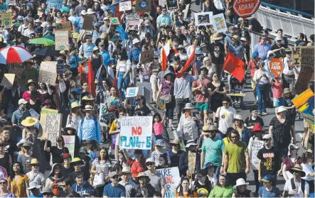  ??  ?? CRISIS: Climate change protesters during the Global Strike 4 Climate rally in Brisbane yesterday,