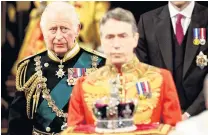  ?? PHOTO: REUTERS ?? Standing in for mother . . . Prince Charles proceeds behind the Imperial State Crown through the Royal Gallery for the State Opening of Parliament at the Palace of Westminste­r in London yesterday.