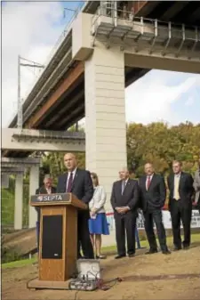  ?? RICK KAUFFMAN — DIGITAL FIRST MEDIA ?? Jeffrey Kneuppel, SEPTA general manager, helped dedicate the recently completed Crum Creek Viaduct Replacemen­t Project on Friday, alongside state Sen. Tom McGarrigle, state Rep. Leanne Krueger-Braneky, Delaware County Council Chairman Mario Civera and...