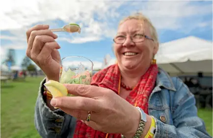  ?? PHOTO: STUFF ?? Sharon Greenslade with one of the many seafood dishes available in 2016.