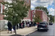  ?? PHOTO COURTESY OF THE PATRICIAN SOCIETY ?? On a typical Food Cupboard day at the Patrician Society in Norristown, people will line up before the 1p.m. opening. The line typically extends around the corner and up Chestnut Street.