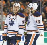  ?? PHOTO D’ARCHIVES, AFP ?? Connor McDavid et Leon Draisaitl ont franchi tous les deux le cap des 50 points dimanche soir lors d’un match contre les Canucks.