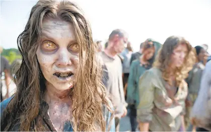  ?? TWD PRODUCTION­S ?? Zombies in the AMC series “The Walking Dead.”