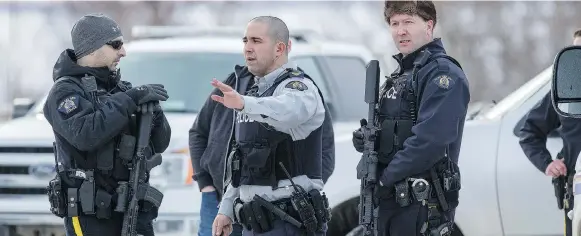  ?? LIAM RICHARDS ?? The La Loche courthouse was under heavy guard Friday as a judge delivered a sentencing decision for the young man who killed four people in the community in 2016. The RCMP and court staff are facing criticism for barring reporters from entering the courthouse during the proceeding. Eventually, a pool reporter was permitted to enter.