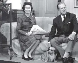  ??  ?? 0 The Queen and the Duke of Edinburgh at Balmoral Castle with