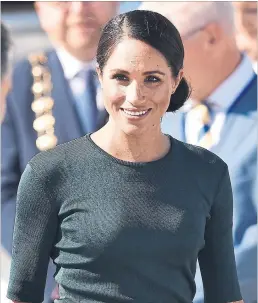  ?? CHARLES MCQUILLAN GETTY IMAGES ?? The Duchess of Sussex Meghan Markle favours brands like Roland Mouret and Givenchy (seen here).