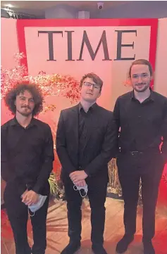  ?? ?? The band pose in front of the Time magazine cover.