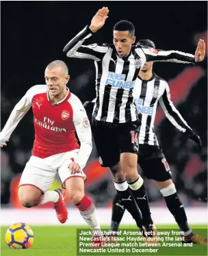  ??  ?? Jack Wilshere of Arsenal gets away from Newcastle’s Isaac Hayden during the last Premier League match between Arsenal and Newcastle United in December