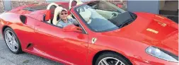  ??  ?? ●●Car dealer Pollastret­ti at the wheel of a Ferarri