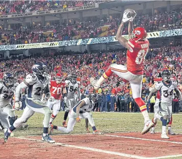  ?? AFP ?? The Chiefs’ Demetrius Harris catches the ball in the end zone for a touchdown during the fourth quarter.