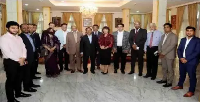  ?? UNITED NEWS OF BANGLADESH ?? Thai Ambassador to Bangladesh Makawadee Sumitmor, sixth from right, meets members of the Bangladesh Thai Chamber of Commerce and Industry (BTCCI) at the Royal Thai Embassy, Dhaka.