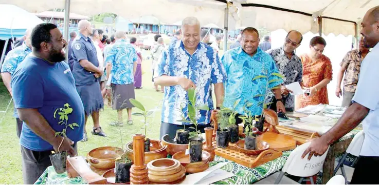  ?? Photo: Deptfo ?? Prime Minister Voreqe Bainimaram­a tours the booths at the roadshow in Bua on July 2, 2018.