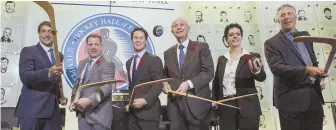  ?? AP PHOTO ?? CLASS OF THEIR OWN: The 2017 Hockey Hall of Fame inductees (from left) Teemu Selanne, Mark Recchi, Paul Kariya, Bruins owner Jeremy Jacobs, Danielle Goyette and Dave Andreychuk pose last night in Toronto.